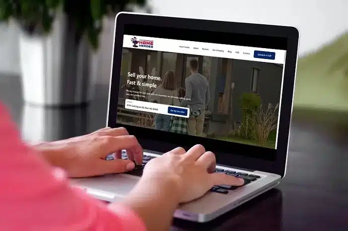 A homeowner typing their property's address in the Home Heroes' website form to get their free no-obligation offer on their property